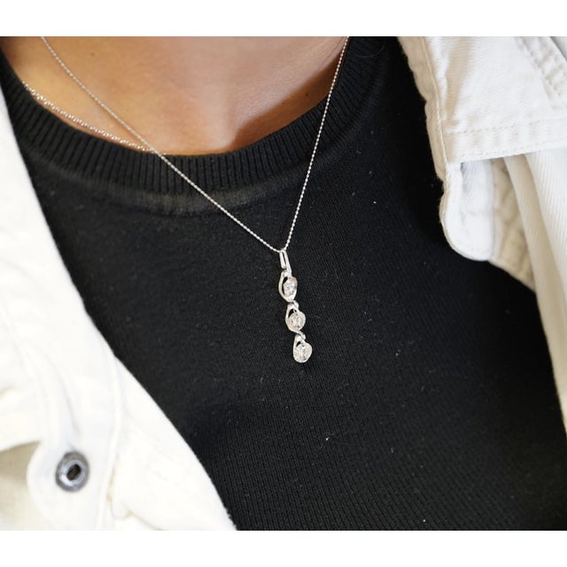 CGL Certified 3.38 Carat Diamond Dangle Pendant Necklace in 18K White Gold. Hand made with a unique setting featuring 3...