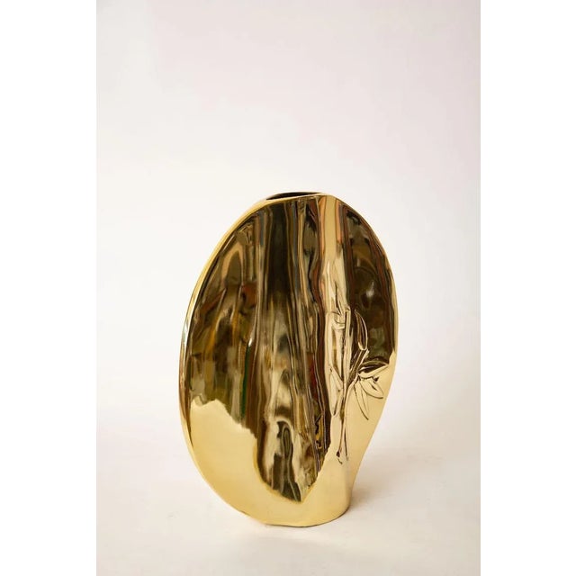 This solid heavy and very large vintage Dolbi Cashier brass vase, vessel and or object has been professionally polished to...