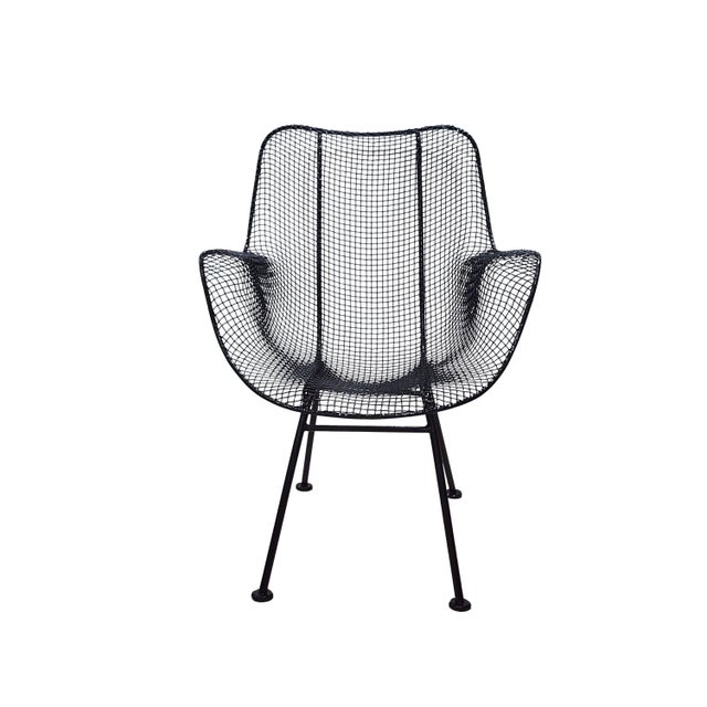 A Mid Century Modern Russell Woodard Sculptura wire and mesh armchair is the focal point you've been looking for. Fresh...