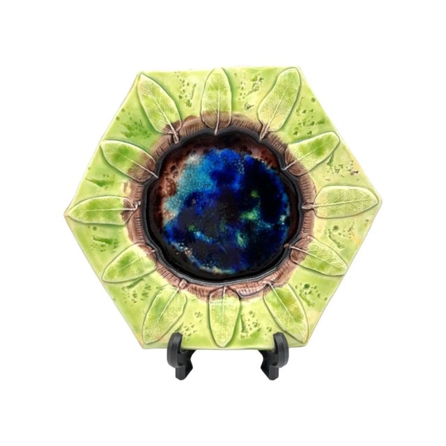 This beautifully crafted Studio Pottery plate features a unique hexagonal shape and a stunning Botanica pattern of Sage...