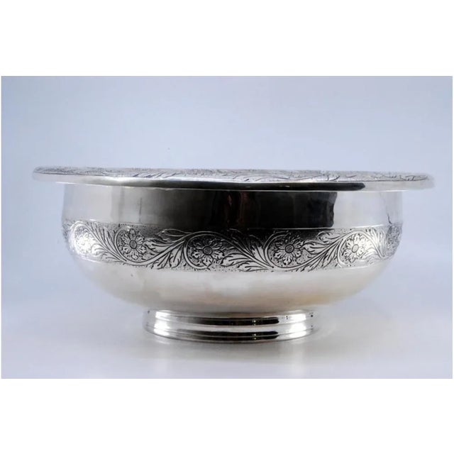 Silver Bowl with Floral Engravings, in Very Good conditions. Designed before 1890 This piece has an attribution mark, I am...