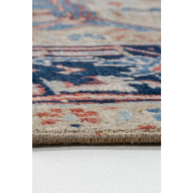 A beautiful hand-knotted rug, traditionally crafted by skilled artisans using fine-quality wool. The hand-knotted...