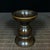 Elevate your tablescape or meditation space with this elegant pair of brass candle holders. Each candlestick features a...