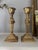 2 Elegant brass candlesticks with a polished gold finish. This pair has a square base tiered base with fluted stem. There...