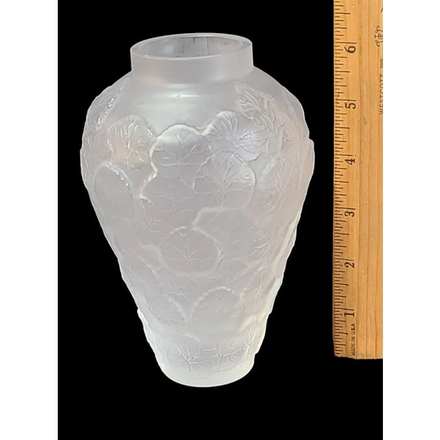 This vintage art deco vase is a beautiful piece of American-made craftmanship. The frosted glass material adds a touch of...