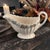 The Vintage Spode Copeland England Felicity Floral Pattern Gravy Boat is a charming and elegant piece of stoneware from...