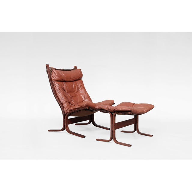 A classic 1970s Siesta lounge chair with ottoman by Ingmar Relling for Westnofa, crafted in Norway and widely recognised...