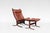 A classic 1970s Siesta lounge chair with ottoman by Ingmar Relling for Westnofa, crafted in Norway and widely recognised...
