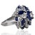 Platinum Ring with 10 round & 5 marquis cut vivid blue sapphires weighing approximately 2.00 carats and 51 round brilliant...