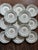 A charming set of thirteen vintage Aynsley fine English bone china plates in the Forget Me Not pattern. Delicate blue...