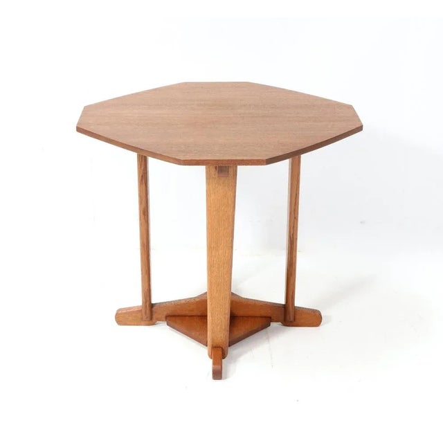 Stunning and rare Art Deco Amsterdamse School center table. Striking Dutch design from the 1920s. Solid oak well designed...