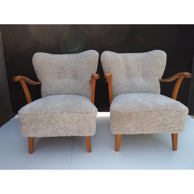A couple of Scandinavian stylish and comfortable sheepskinn loungechairs from the charming 1940s Sweden. The color of the...