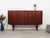 The highboard was made in the 1960s, Danish production. The structure is covered with teak veneer. The legs and handles...