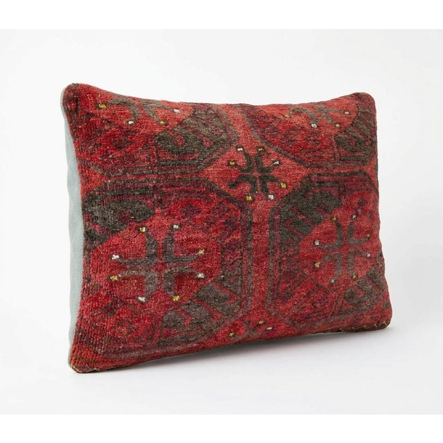 This beautiful 16'' x 24'' pillow cover was made from an authentic Turkish rug. Bright colors of wool adorn the front of...