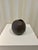 Dimensions: 6.5” diameter x 7”h Material: stoneware Finishing: unglazed Color: mushroom Edition: one-of-a-kind