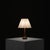 Defined by its elegant proportions and organic silhouette, this table lamp is a refined example of Danish design from the...