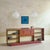 A set of twenty-three French ceramic plates and bowls from the 1960s, each one hand-thrown and incised with a repeating,...