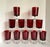 Here is a stunning set of ELEVEN ruby red glasses made in France by Arcoroc in the later mid-century. The glasses have a...