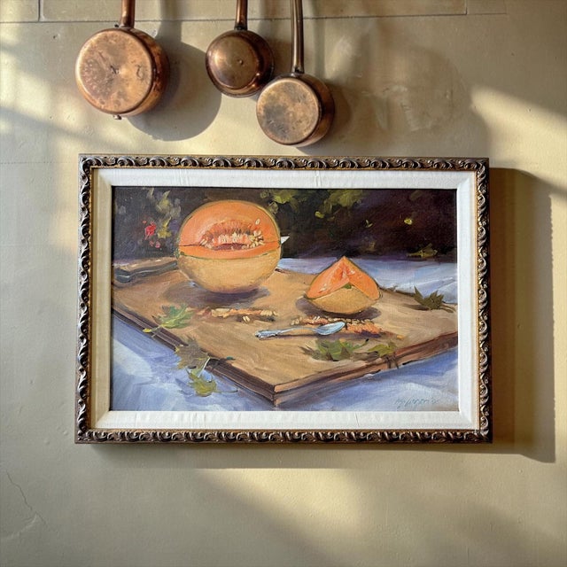 A vibrant original oil on canvas by California artist Michael Logan (1939-2016), depicting a freshly cut cantaloupe...