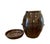 A vintage, hand made red ware jar/crock. Features a brown glaze over a hand firmed red ware pottery vessel. Complete with...