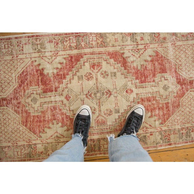 :: Stepped center medallion with elongated finials bearing interior outwardly directed floral blossoms and geometric form...