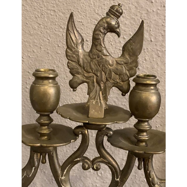 A Pair of 4 arm Brass Candelabra for candle lighting on the Sabbath. Great Condition, extremely heavy. This pair is so...