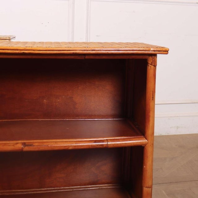 Pair of vintage french bamboo & rattan low bookcases. One is slightly lighter in colour than the other. 1920 Dimensions:W:...