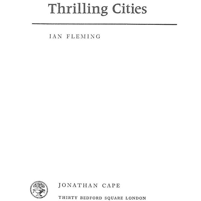 FLEMING, Ian [223] pp. Jonathan Cape 1964 Third Edition 9" x 6 1/2" Jacket design by Paul Davis Ian Fleming's world...
