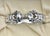 A handsome sterling silver napkin ring by Georg Jensen of Denmark, stamped with the maker's oval "GEORG JENSEN" mark...