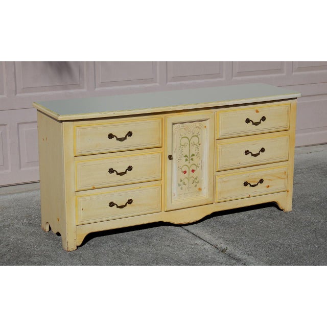 Add a touch of vintage charm to your home with this delightful Burlington House Furniture Lexington dresser. This unique...