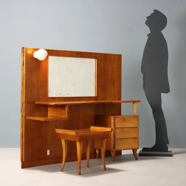 Vintage dressing table of Italian manufacture from the 20th century made of oak veneer with stool, shelf and small chest...