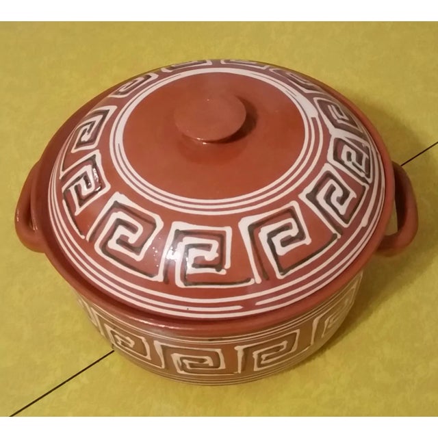Here's an especially nice terrace cotta or redware covered dish that was most likely made in Bucharest, Romania though...