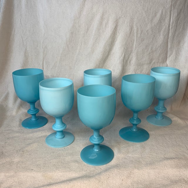 Produced in France primarily during the 1930s, this specific "robin's egg" or "Tiffany blue" color is the signature look...