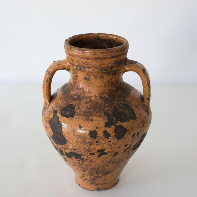 A generously proportioned antique terracotta vase, dating from the 18th or 19th century, with a beautifully balanced form...