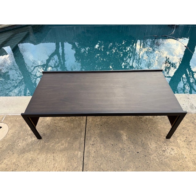 Modern walnut coffee table designed by Kara Mann for Baker Furniture Milling Road. Beautiful walnut in a charcoal stain...