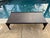 Modern walnut coffee table designed by Kara Mann for Baker Furniture Milling Road. Beautiful walnut in a charcoal stain...