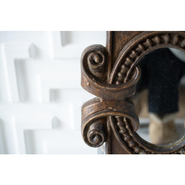 This listing is for a super cool wall mirror in a Spanish/Art Nouveau style. Is is made of a dense foam material NOT WOOD....