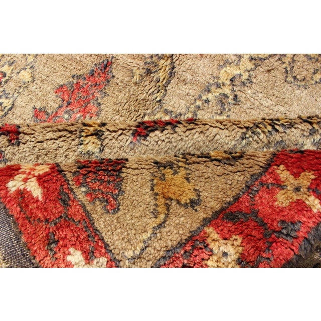 Turkish Tulu With Repeating Tribal Motifs on a Sand Field Surrounded by a Red Border For Sale - Image 11 of 13