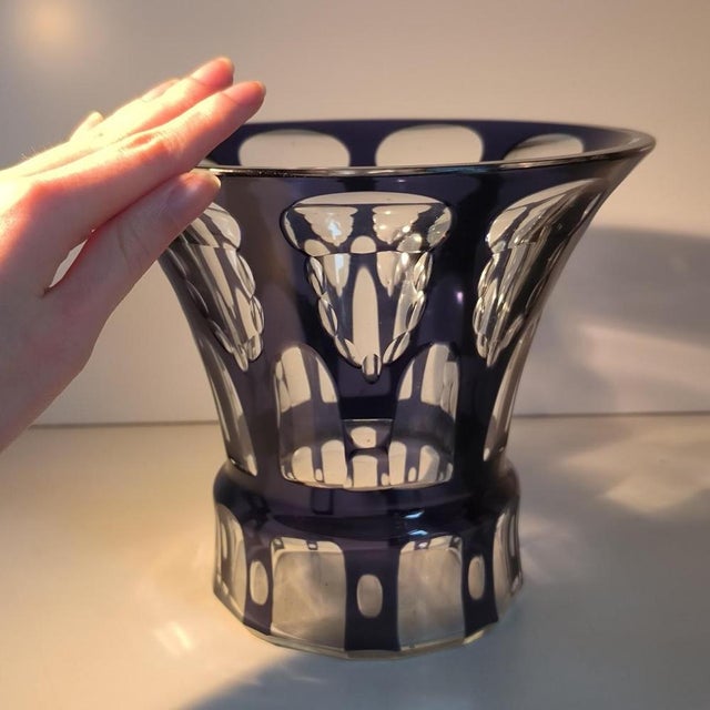 Art deco vase in purple double-layered glass. Geometric decoration carved with wide panels and oval reserves. Work...