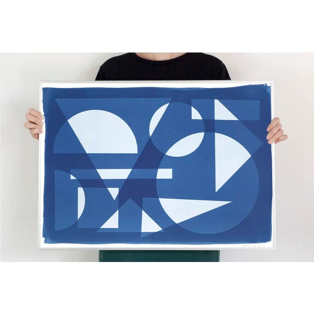 This is an exclusive handprinted unique cyanotype that takes its inspiration from the mid-century modern shapes. It's made...