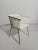 Solid beech wood armchair. Back composed of feattes inserted by interlocking in the base. This piece is attributed to the...