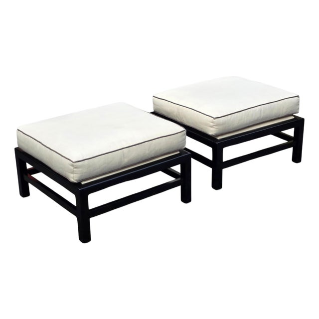 Pair of Baker Furniture Black Lacquered Wood Frame Ottomans With Ivory Upholstered Cushions For Sale