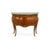 A Louis XV style commode of bombe serpentine form. Two drawers are veneered sans traverse in quarter-matched figured wood,...