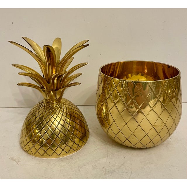 Brass Pineapple Shaped Covered Container. Good overall condition. Any dark areas in photos is reflection. Hand polished....