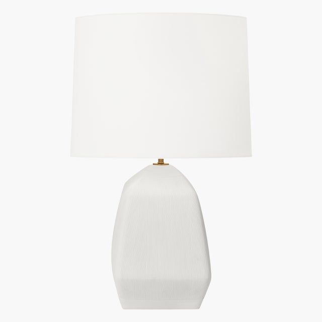 The Tallulah one-light table lamp by Hable provides abundant light for your home while adding style and interest. Details:...