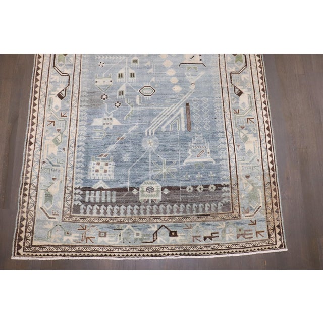 An early 20th century blue-gray persian malayer geometric runner
