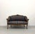 An elegant vintage Louis XV-style settee featuring a beautifully carved walnut frame with graceful cabriole legs,...