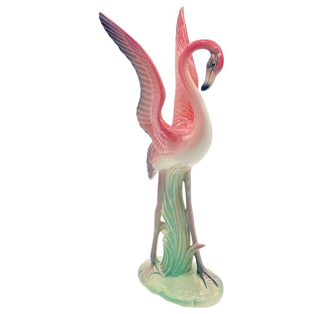 Mid-century pink and green matching California ceramic flamingo tabletop statues by Brad Keeler. The set features two...