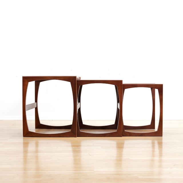 Mid-century set of 'quadrille' nesting tables by VB Wilkins for G Plan. Constructed from teak and afromosia, these quality...