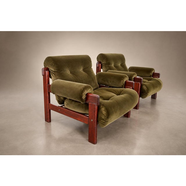 A rare pair of iconic “Copa” lounge chairs designed by Jean Gillon for Italma during the 1960s, combining sculptural...